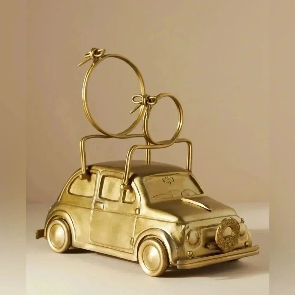 Anthropologie Brass wine bottle holder home decor bar cart bows car gift gold